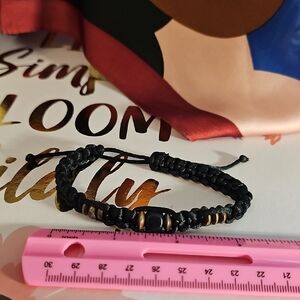 Black and Gold Beaded Bracelet with Elastic Design